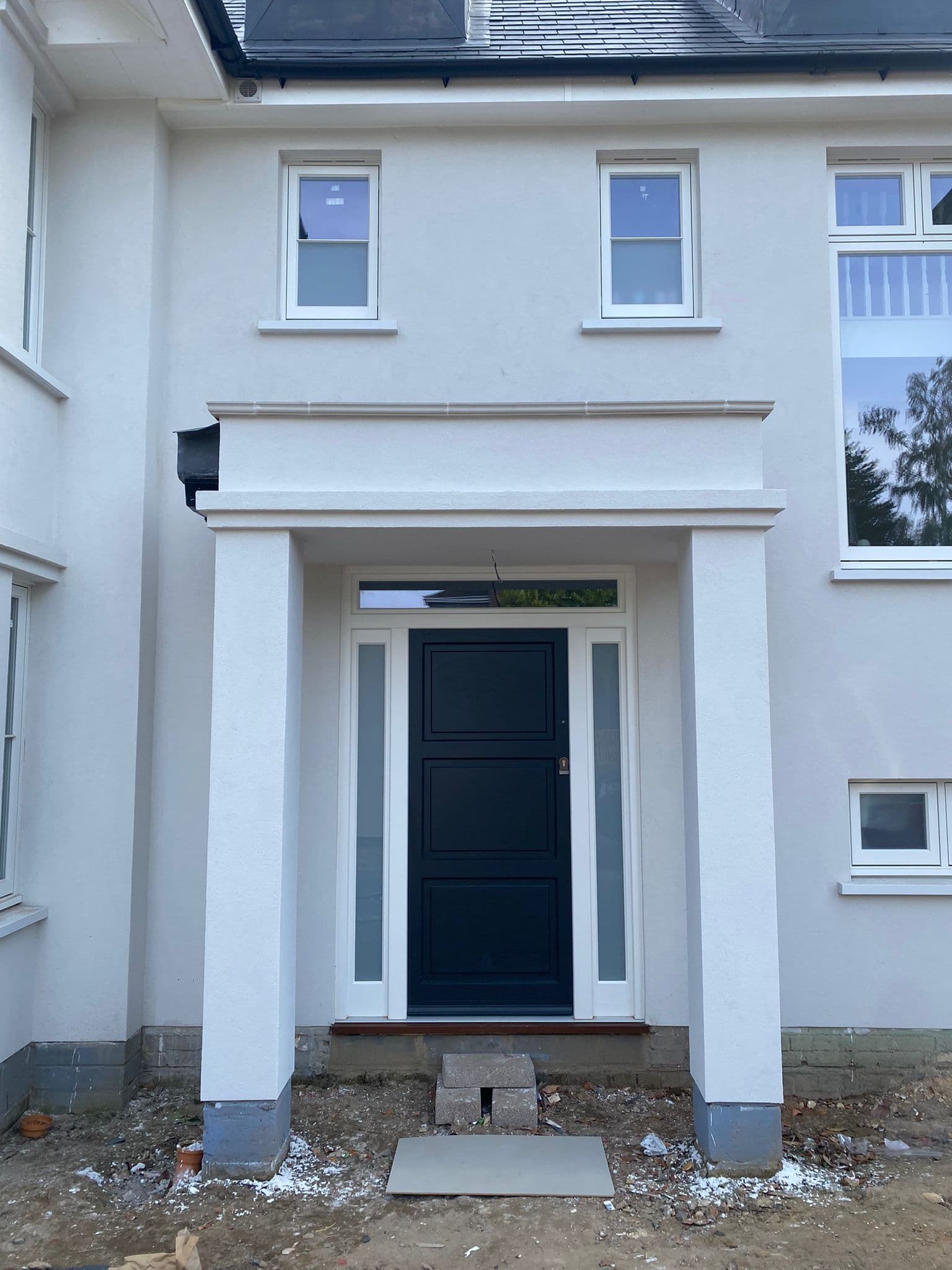 Navy timber entrance door with sidelights