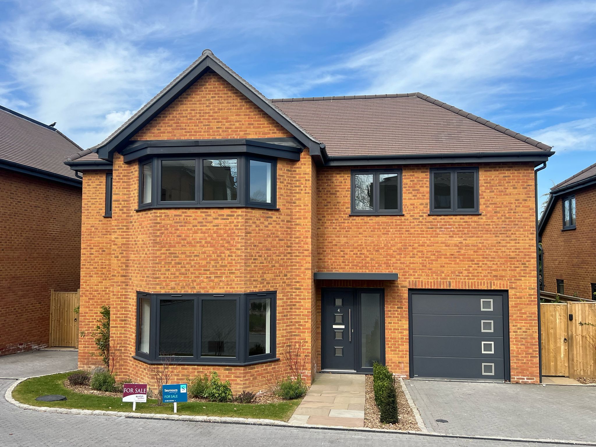 New Surrey home with a composite front door