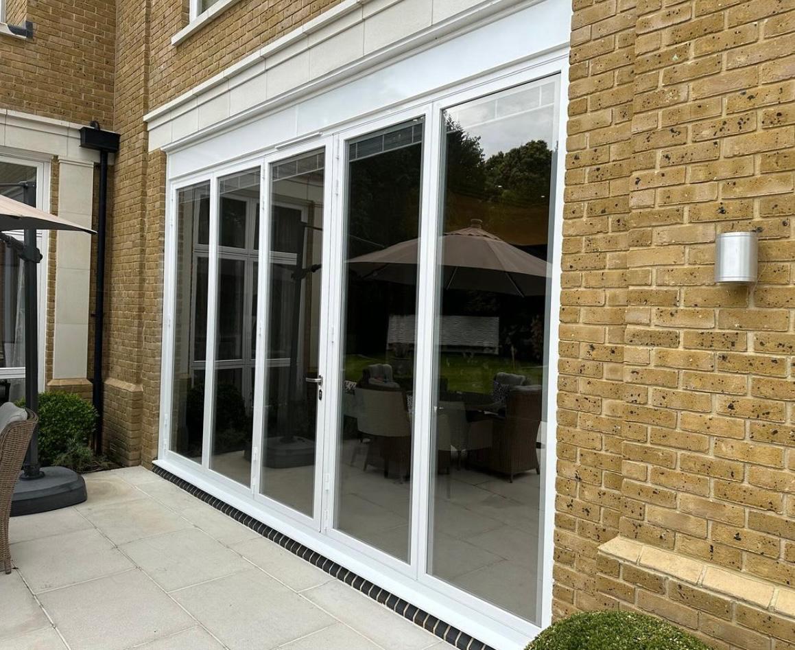 Origin Global “OB49” bifold doors in white