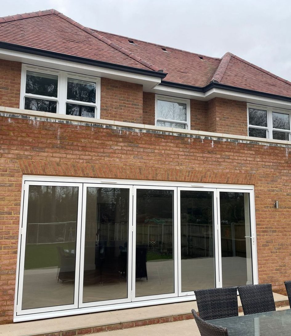 Smart “Visofold” bifold doors in white
