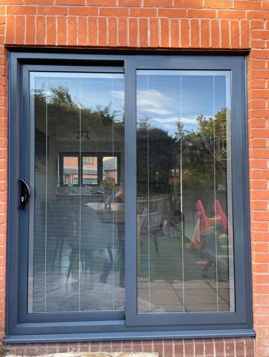 Smart “Visoglide” with integral blinds. In anthracite grey.