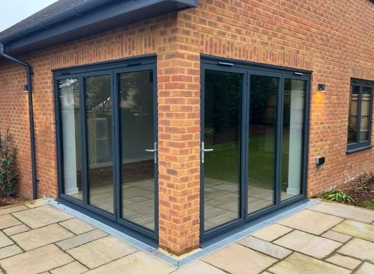 Smart “Visoglide” patio sliding door in anthracite grey. Renaissance 7 “French doors”.