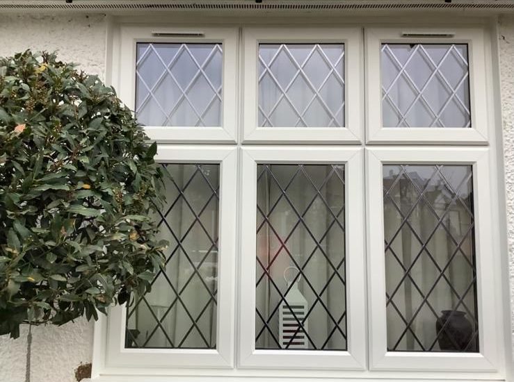 Rehau S706 casement windows with diamond lead