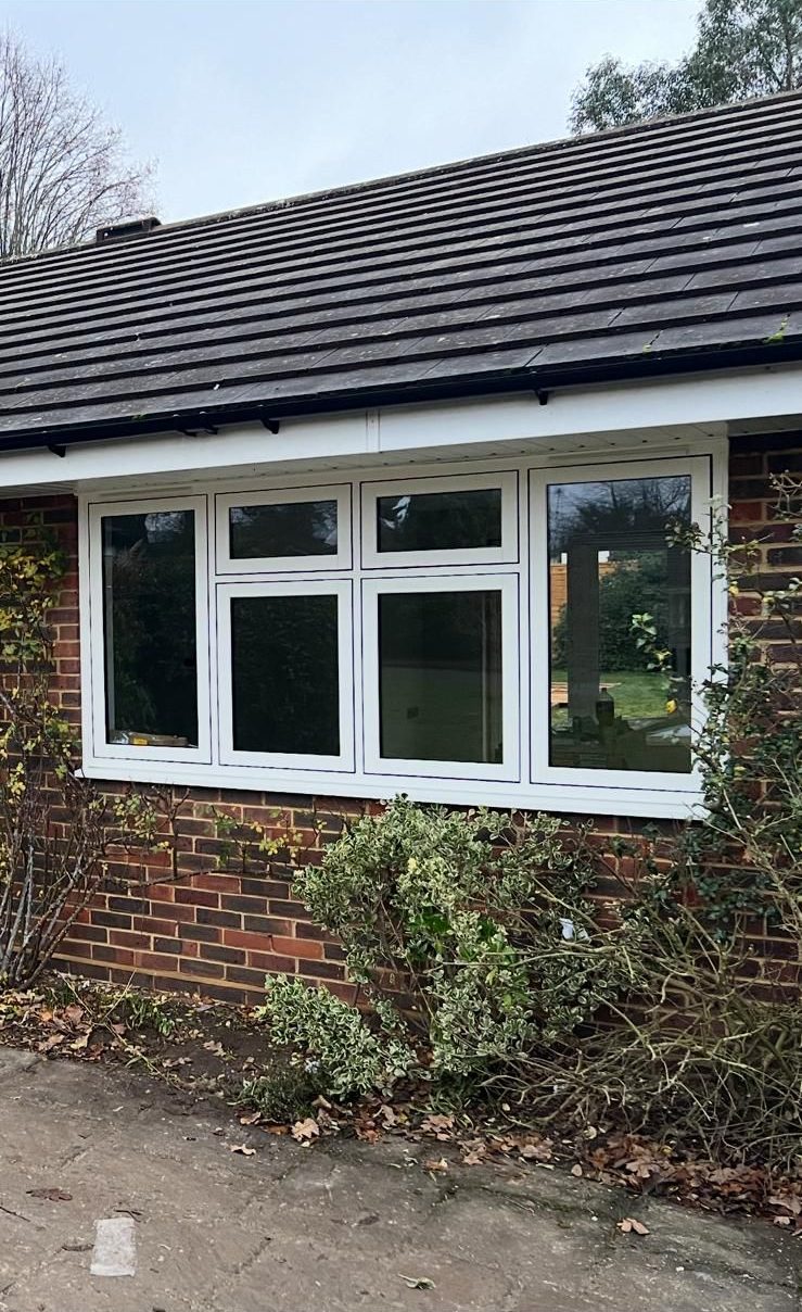 Timberlook flush casement windows.